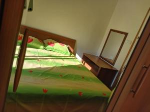 Postel nebo postele na pokoji v ubytování Apartman Olja