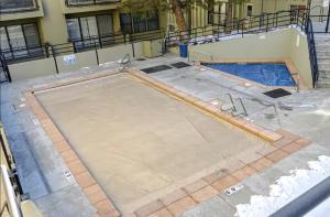 a basketball court is under construction in front of a building at Edelweiss Haus by All Seasons Resort Lodging in Park City
