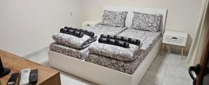 a couch and a chair in a living room at Ново ! Апартамент Dreams 1 in Sliven