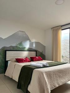 Voodi või voodid majutusasutuse Hostal Amanari toas