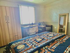 Letto o letti in una camera di Quiet Apartment in Redemption Camp, Ogun State