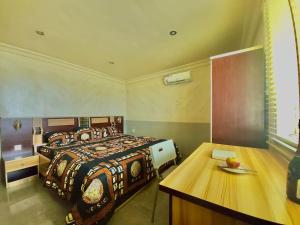 Letto o letti in una camera di Quiet Apartment in Redemption Camp, Ogun State