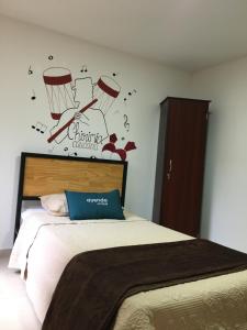 Cama o camas de una habitación en Hostal Amanari