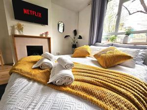 Ein Bett oder Betten in einem Zimmer der Unterkunft Golden Stay flat next to Camden Town