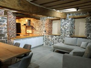 Posezení v ubytování Ancienne ferme totalement rénové moderne à Baelen