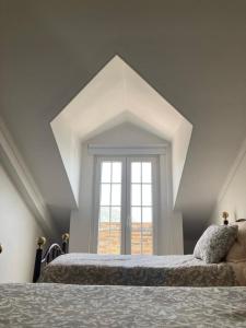 Tempat tidur dalam kamar di Casa da Nazaré