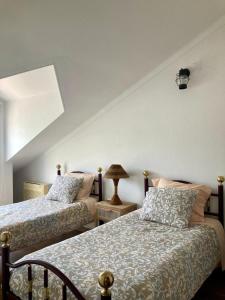 Tempat tidur dalam kamar di Casa da Nazaré