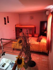 Giường trong phòng chung tại Departamentos Anahí