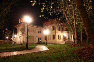 A garden outside Villa delle Rose