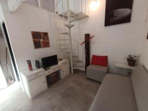 O zonă de relaxare la Casa del Angel Duplex Centrico con Patio