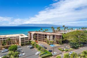an aerial view of a parking lot and the ocean at Hono Koa Vacation Club in Lahaina
