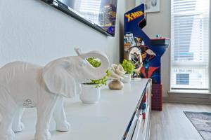 a toy elephant on a counter in a room at Downtown Saint Pete 2 Bed Near Tropicana Field in St Petersburg