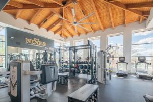 a gym with lots of treadmills and machines at Exclusive Unit Golf Side- Walkable Area - King Bed - N248 in Scottsdale