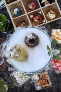 a table topped with different types of desserts at Kempinski Hotel Guiyang in Guiyang