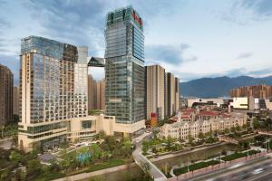 a city with tall skyscrapers in a city at Kempinski Hotel Fuzhou in Fuzhou