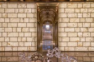 a hallway in a building with a wall at Kempinski Hotel Nanjing in Nanjing