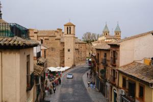 a view of a street in a city with buildings at Los Miradores del Arrabal in Toledo