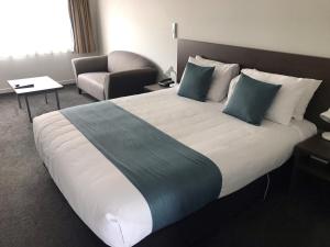Postel nebo postele na pokoji v ubytování Airport Delta Motel