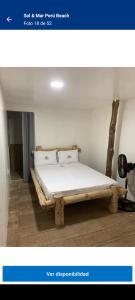 a bed sitting in a room with at Venido del Mar Turquesa White Beach Barù in Cartagena de Indias