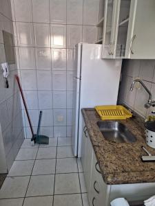 Kuhinja oz. manjša kuhinja v nastanitvi Apartamento Millenium Thermas Residence 103 - B