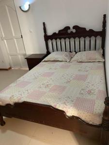 Postel nebo postele na pokoji v ubytování Room in Achada São Filipe, Praia