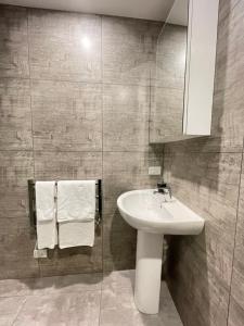 Koupelna v ubytování Grand Central Serviced Apartments