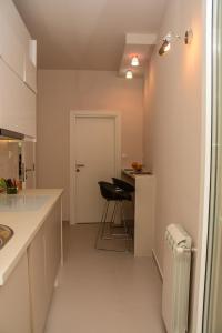 A cozinha ou cozinha compacta de Apartment Venera A&M