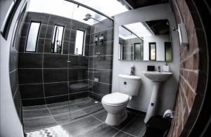 Koupelna v ubytování Hotel Gran Boutique Sabana