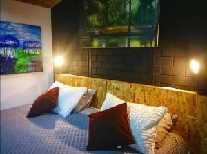 Postel nebo postele na pokoji v ubytování Hotel Gran Boutique Sabana