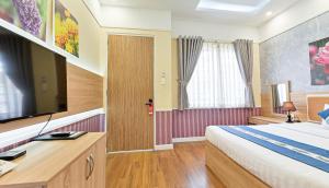TV a/nebo společenská místnost v ubytování Sao Vang Hotel