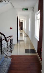 Postel nebo postele na pokoji v ubytování Tâm Dung Hotel Đà Lạt