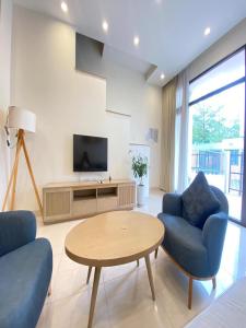 Et tv og/eller underholdning på Chuỗi Villa lotus 5 Ngủ Gần biển