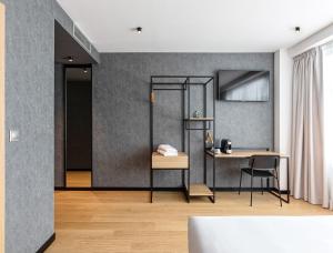 Postel nebo postele na pokoji v ubytování Hotel Forum Ceao + 37 fotografií