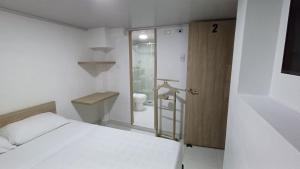 Katil atau katil-katil dalam bilik di Hotel Adel