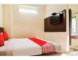 מיטה או מיטות בחדר ב-Hotel Kasturi Continental, Bhopal