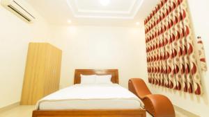 Postel nebo postele na pokoji v ubytování 158A Hotel