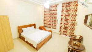 Postel nebo postele na pokoji v ubytování 158A Hotel