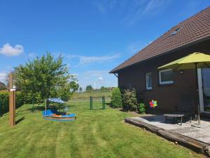 Taman di luar Holiday home Nordseeglück