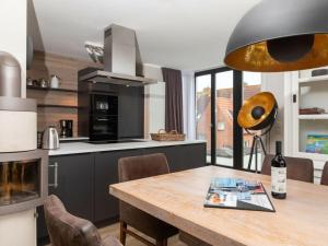 Kuchyň nebo kuchyňský kout v ubytování Reethuus Nord Modern retreat + 29 fotografií