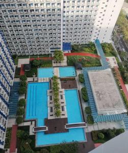 Bazén v ubytování Condo UNIT-SM JAZZ RESIDENCES nebo v jeho okolí