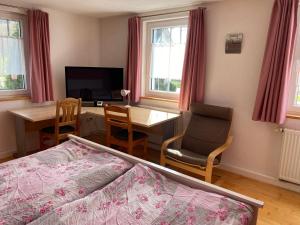 Ένα ή περισσότερα κρεβάτια σε δωμάτιο στο Ferienzimmer Oelhaf Zimmer in Rosé Self Check-In mit Key-Tresore