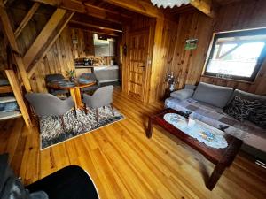 an overhead view of a living room in a cabin at Domek u Karkonosza in Kamienna Góra