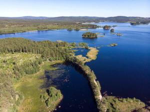an aerial view of a lake with islands in it at Holiday home FREDRIKSBERG III in Fredriksberg