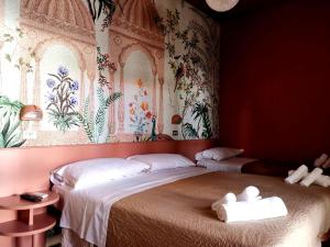 a bedroom with a bed with towels on it at Casa Dorita - Free Coffee Corner 8-12 in Cervia