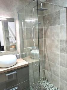 Un baño de Chez Laura et Benjamin ! Maison à la plage climatisée