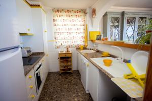 Kuchyň nebo kuchyňský kout v ubytování Apartamento Bellavista + 17 fotografií