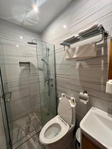 Koupelna v ubytování Raim Hotel