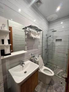 Koupelna v ubytování Raim Hotel