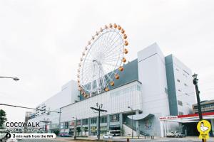 ein großes Riesenrad auf einem Gebäude in der Unterkunft Urakami #201 / Vacation STAY 41894 in Nagasaki