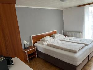 Postel nebo postele na pokoji v ubytování Hotel Altneudörflerhof
